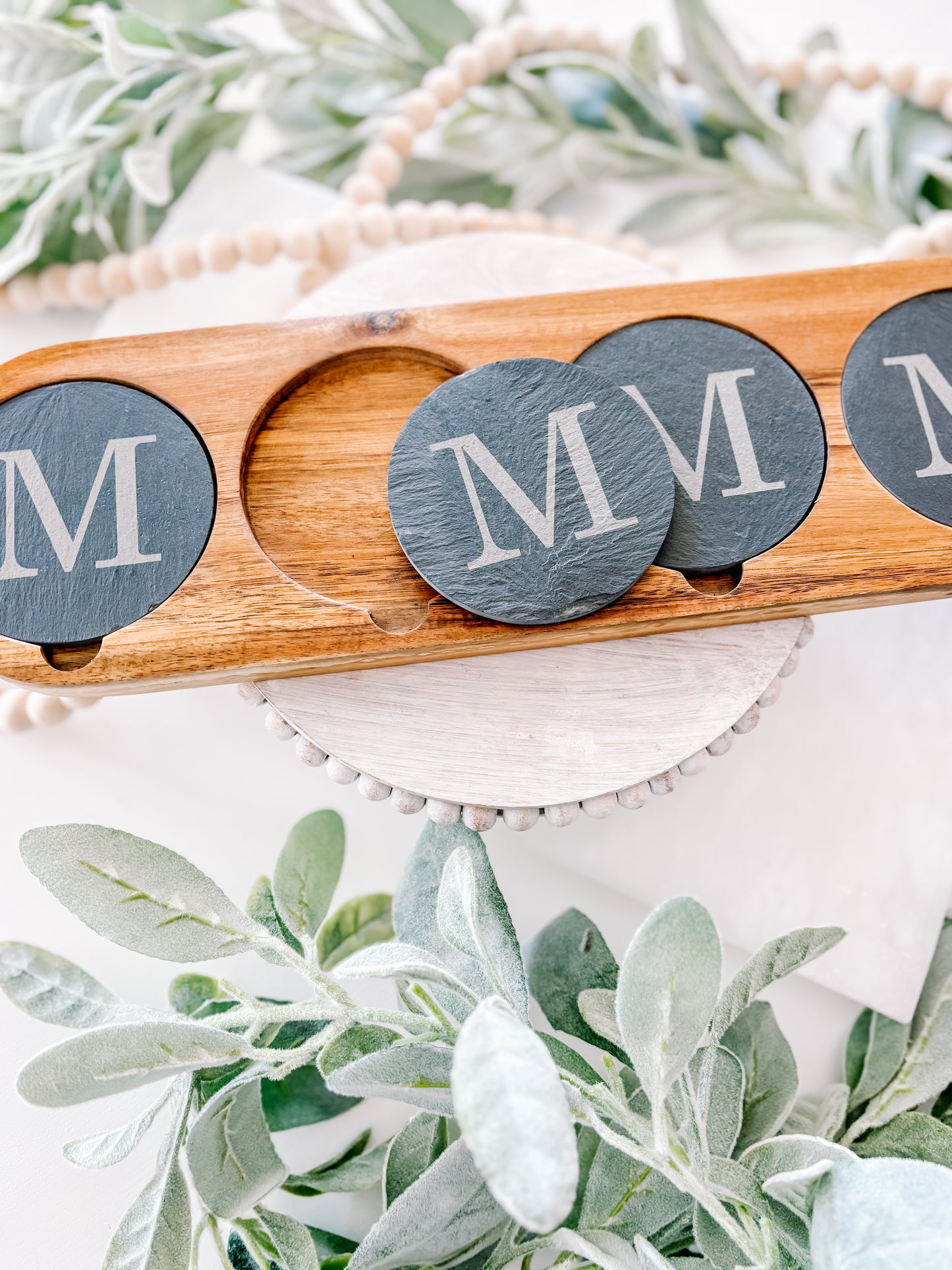 Coaster paddle with customized coasters