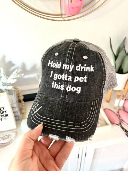 "Hold my drink I need to pet this dog"  hat.