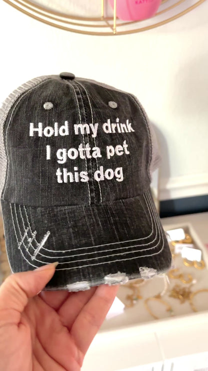 "Hold my drink I need to pet this dog"  hat.